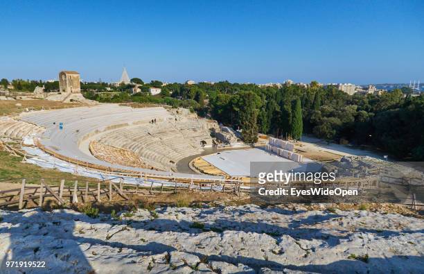 Teatro Greco, the ancient greek theatre in the Archeological Park on April 9, 2018 in Syracuse, Sicily, Italy.