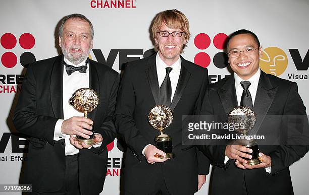 Avatar" senior visual effects supervisor Joe Letteri, animation director Andrew R. Jones and facial lead Jeff Unay pose with their awards for...