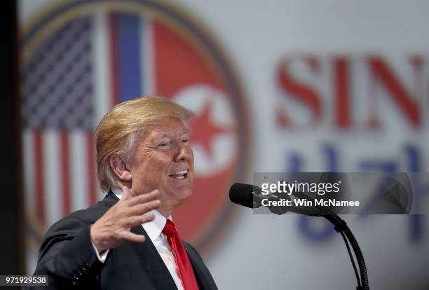 President Donald Trump answers questions during a press conference following his historic meeting with North Korean leader Kim Jong-un June 12, 2018...