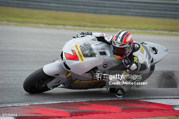 Hiroshi Aoyama of Japan and Interwetten MotoGP Team rounds the bend during the day of testing at Sepang Circuit on February 26, 2010 in Kuala Lumpur,...