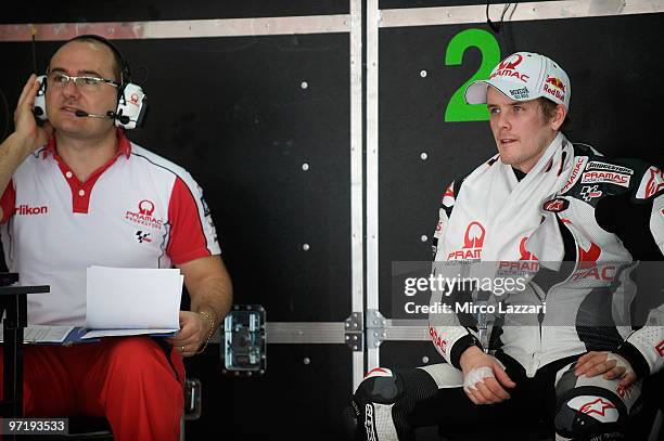 Mika Kallio of Finland and Pramac Green Team looks on in box during the day of testing at Sepang Circuit on February 26, 2010 in Kuala Lumpur,...