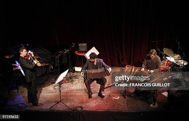 Argentinian Matias Gonzalez of the Calo - Couranjou quartet, plays the concertina as he performs on the stage of the Studios de l'Ermitage on...