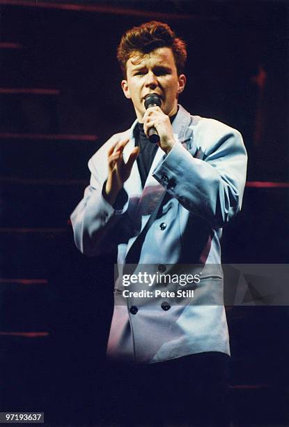 Rick Astley performs on stage at Wembley Arena on December 15th, 1988 in London, England.
