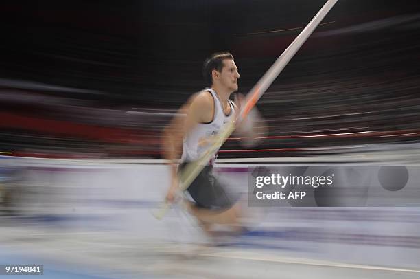 French athlete Renaud Lavillenie competes in the pole vault contest during the French athletics indoor championships on February 28, 2010 at Bercy...