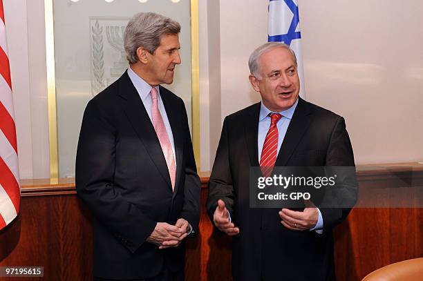 In this handout photo provided by the Israeli Government Press Office , Prime Minister Benjamin Netanyahu meets with US Sen. John Kerry in Jerusalem,...