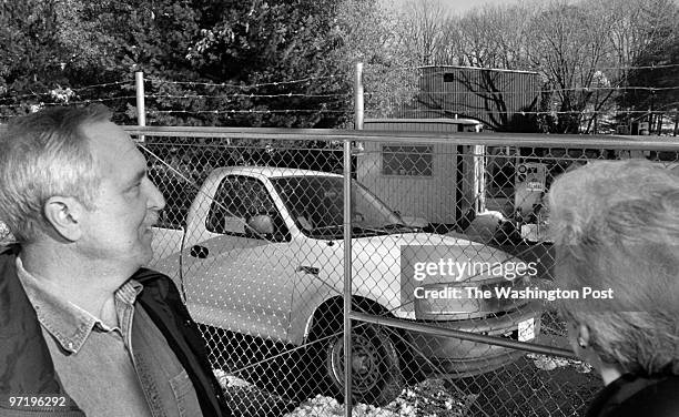 Washington, D.C.--PHOTOGRAPHER-MARVIN JOSEPH/TWP--CAPTION-Residents say they hear the sounds of loud blasts cominng from behind this fence. Nicholas...