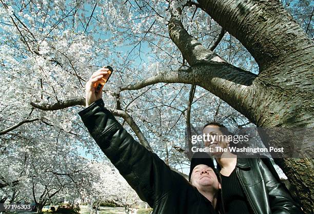 Ph/kenwood Jahi Chikwendiu/TWP Tyson Carlone and Saira Awan, who live in College Park, try to produce a self-portrait with a disposable camera under...