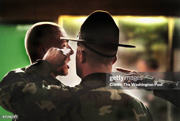 Marines Jahi Chikwendiu/TWP Sergeant Robert Sanchez has some choice words for a new Marine recruit at boot camp on Parris Island, SC. ORG XMIT: 118174