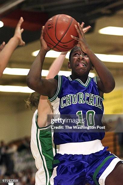 Digital image Maryland 4A Girls basketball semifinals daily coverage. Final Churchill 70 over Arundel 61. This is Churchill Alis Freeman, driving in...