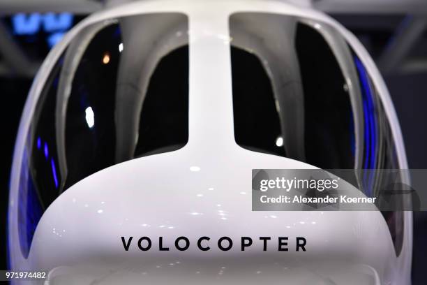 The Volocopter 2X, a fully electric helicopter powered by 18 turbines and produced by Intel is displayed at the Intel stand at the 2018 CeBIT...