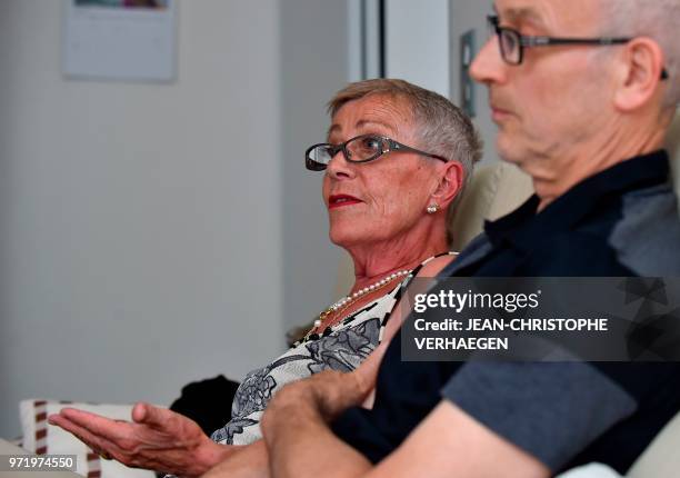Sylvie Richard who suffers from an incurable form of cancer reacts as she sits next to her partner Bernard Lacour during an interview on June 1, 2018...