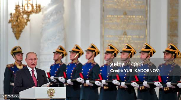 Russian President Vladimir Putin delivers a speech during the State Prize awards ceremony marking the 'Day of Russia' at the Grand Kremlin Palace in...