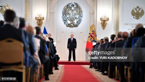 Russian President Vladimir Putin attends the State Prize awards ceremony marking the 'Day of Russia' at the Grand Kremlin Palace in Moscow, on June...