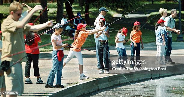 Fishing Oumaima Ghoumari casts out into the pond in Constitution Gardens as the DC area opens the Youth Kick Off of the National Fishing and Boating...