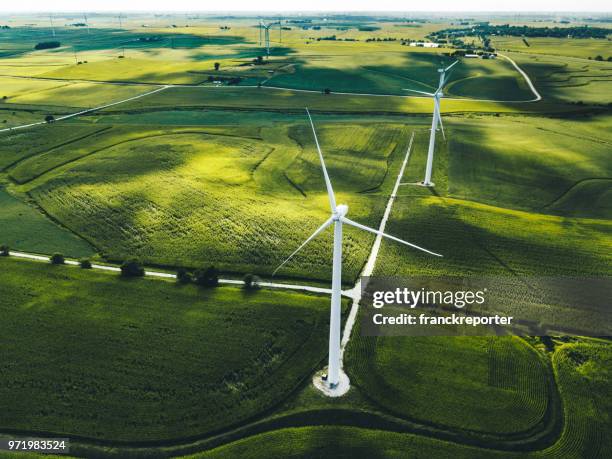 wind turbine field - helicopter point of view stock pictures, royalty-free photos & images