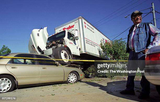 At the scene of an auto accident at the intersection of East-West highway and Riggs road this morning involving 7 vehicles, including a Ryder truck...