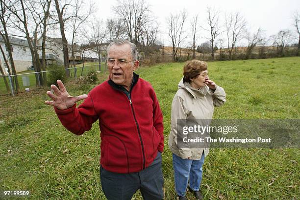 Woodwardt 134519 Opposition in Front Royal, VA., to a new Walmart. George McDermott and his wife, Ann, standing in the field where the new Walmart,...