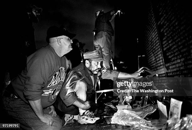 Vietnam Memorial Wall, Washington, D.C.--PHOTOGRAPHER-MARVIN JOSEPH/TWP--CAPTION-Joe Jastzrab of Chicago, Ill and his friend John Negron of Miami,...