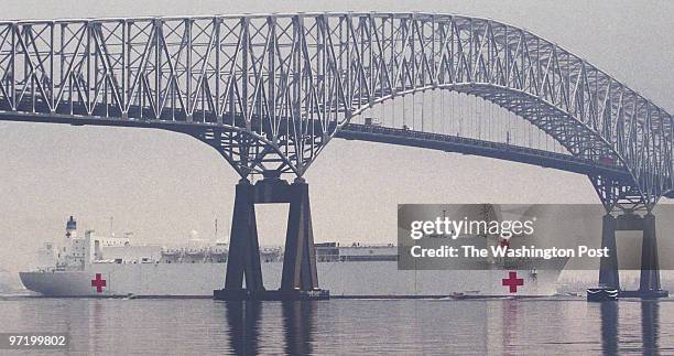 The USNS Comfort heads out of Baltimore harbor, passing beneath the Key bridge, on it's way to the Indian ocean to support American military efforts...