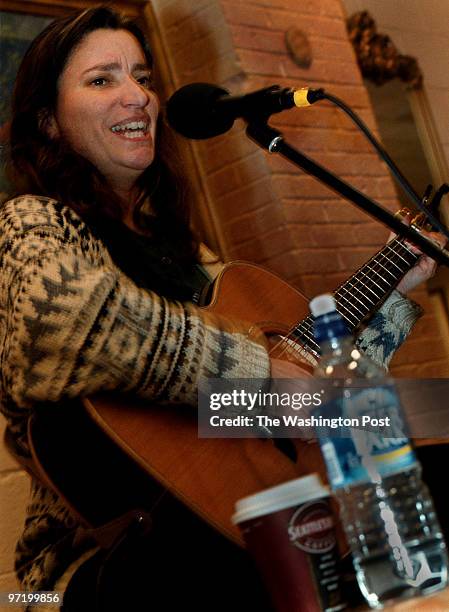 Bowie,Maryland--PHOTOGRAPHER-MARVIN JOSEPH/TWP--CAPTION-Profile of Year of the Rabbit Coffee Pub. PICTURED, Vocailst Gina DeSimone performs live...