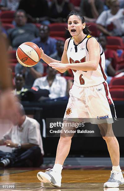 Sandy Brondello of the Miami Sol brings the ball upcourt during the game against the Indiana Fever on June 30, 2002 at American Airlines Arena in...