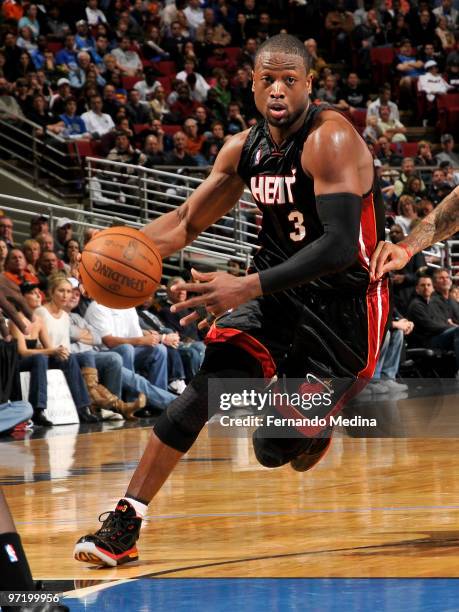 Dwyane Wade of the Miami Heat drives against the Orlando Magic during the game on February 28, 2010 at Amway Arena in Orlando, Florida. NOTE TO USER:...