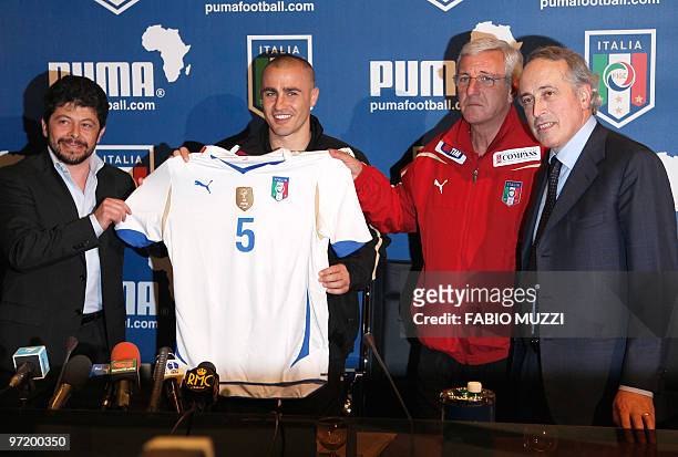 The president of the Italian football federation Giancarlo Abete , Italian National football team coach team Marcello Lippi and Puma's marketing...