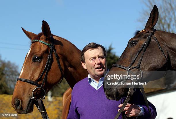 Racehorse trainer Nicky Henderson with Punchestowns and Long Run at an open day at his lambourn stables on March 1, 2010 in Lambourn, England. The...