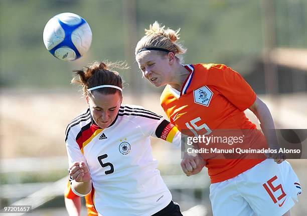 Valeria Kleiner of Germany and Kika van Es of Netherlands compete for the ball during the women's international friendly match between Germany and...