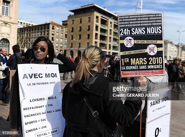 People stage a demonstration in front of the Marseille City Hall on a "Day without immigrants" on March 1, 2010. Peggy Derder, Nadir Dendoune and...
