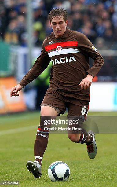 Bastian Oczipka of St. Pauli runs with the ball during the Second Bundesliga match between FC St. Pauli and Arminia Bielefeld at the Millerntor...