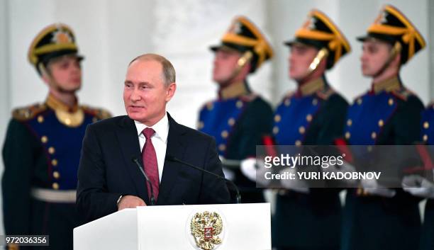 Russian President Vladimir Putin delivers a speech during the State Prize awards ceremony marking the 'Day of Russia' at the Grand Kremlin Palace in...