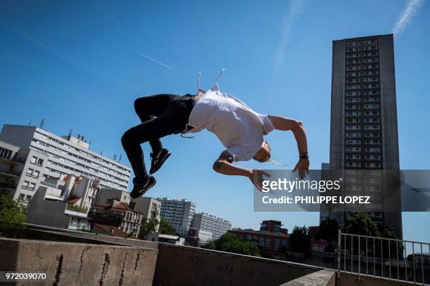 Johan Tonnoir, practices Parkour, an obstacle course method derived from military training "parcours du combattant" , on May 17, 2018 in Paris.