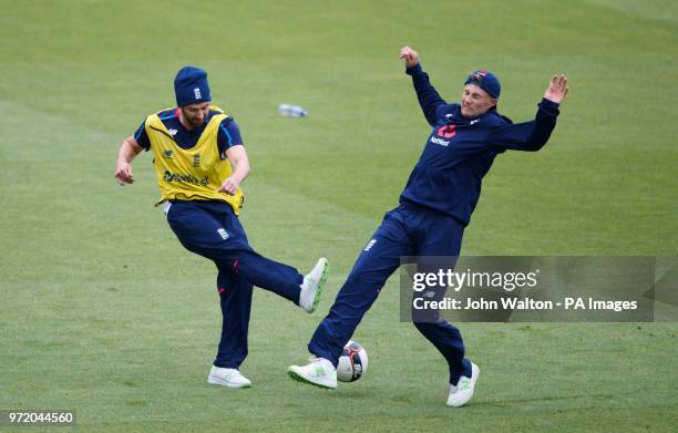 England's Mark Wood is tackled by Joe Root during their game of football during a nets session at The Kia Oval, London.