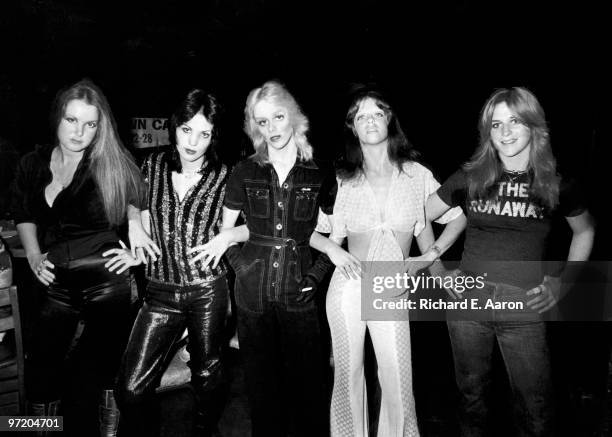 The Runaways posed at CBGB's club in New York in August 1976 L-R Lita Ford, Joan Jett, Cherie Currie, Jackie Fox, Sandy West