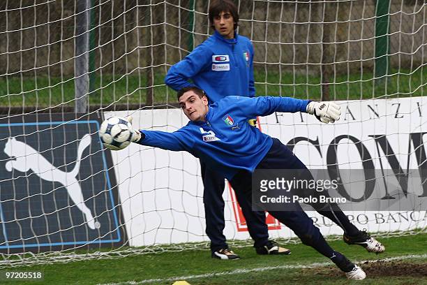 Vito Mannone the goalkeeper of Under 21 in action as Mattia Perin looks on during Italy U21 training at Sport Center La Borghesiana on March 1, 2010...