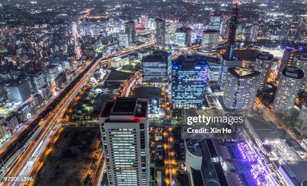 yokohama minato mirai 21 at night - xin he stock pictures, royalty-free photos & images