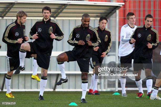 Aaron Hunt, Arne Friedrich, Cacau, Christian Traesch, Toni Kroos and Miroslav Klose stretch during the training session of the German National team...