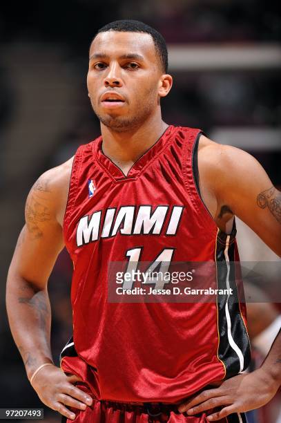 Daequan Cook of the Miami Heat stands on the court during the game against the New Jersey Nets on February 17, 2010 at the Izod Center in East...