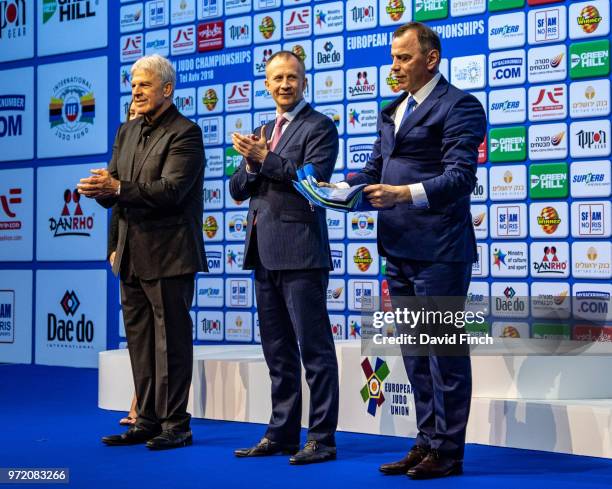 President of the Belarusia Judo Federation, Pavel Yasenovsky emotionally holds the European Judo Union Flag on behalf of his country, Belarusia, who...