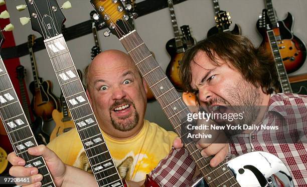 Actors Jack Black and Kyle Gass clown around during a visit to the Gibson Guitar showroom on W. 54th St. They play rock stars in the upcoming comedy...