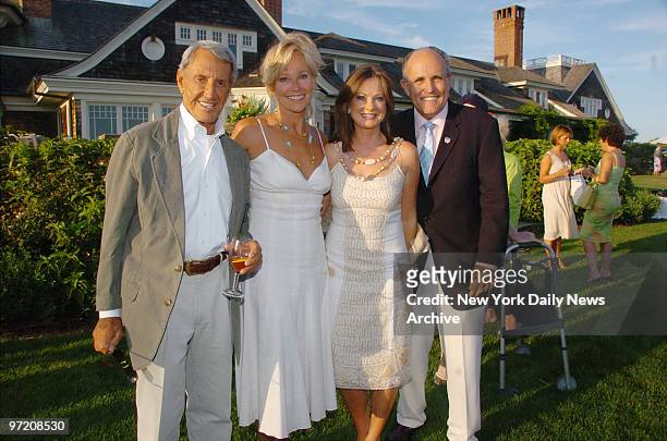 Actor Roy Scheider, his wife Brenda Siemer, Judith Giuliani and her husband, former New York City Mayor Rudy Giuliani , attend a CancerCare benefit...