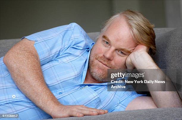 Actor Philip Seymour Hoffman relaxes on a couch at the offices of No Hope Productions on Broadway in lower Manhattan. He plays celebrated author...