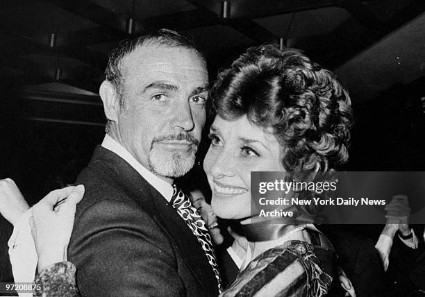 Actor Sean Connery dances with Audrey Hepburn during party at Tower Suite following premiere of their movie "Robin and Marian."