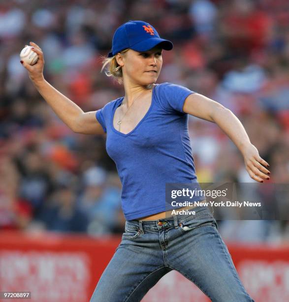 Actress Julia Stiles throws out the first pitch to New York Mets' catcher Paul Lo Duca at the start of a game against the Arizona Diamondbacks at...