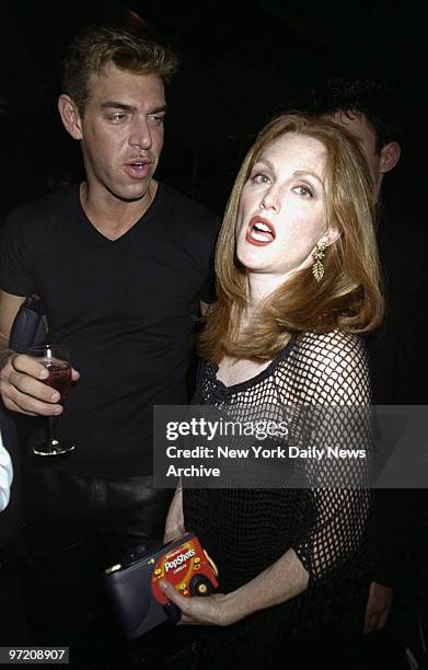 Actress Julianne Moore and Kevin Aucoin attending In Style magazine party at Chelsea Piers.