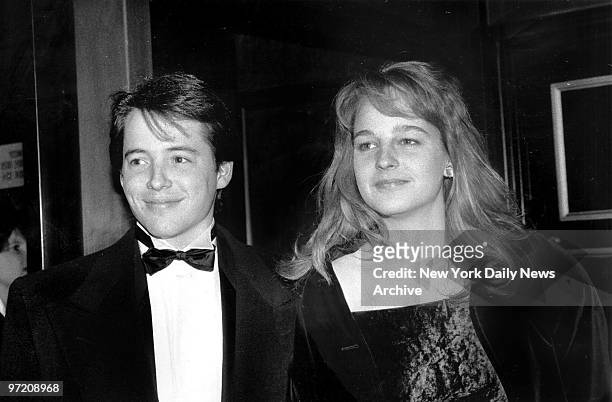 Actor Matthew Broderick and his date actress Helen Hunt, seen here entering the Ziegfeld Theater for the world premiere of "Glory". Broderick stars...