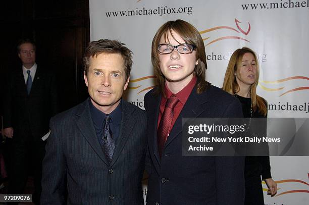 Actor Michael J. Fox and son Sam are on hand for "A Funny Thing Happened on the Way to Cure Parkinson's...," a benefit dinner held in the grand...