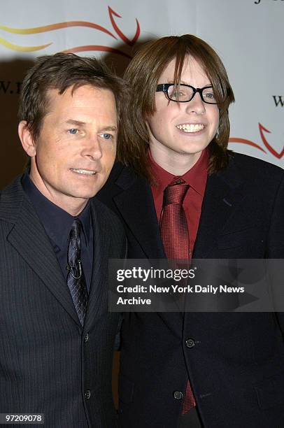 Actor Michael J. Fox and son Sam are on hand for "A Funny Thing Happened on the Way to Cure Parkinson's...," a benefit dinner held in the grand...