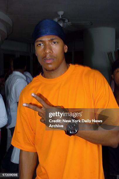 Actor Nick Cannon flashes a peace sign during a party hosted by Ocean Drive magazine at the Ritz-Carlton, South Beach hotel in Miami Beach, Fla., a...